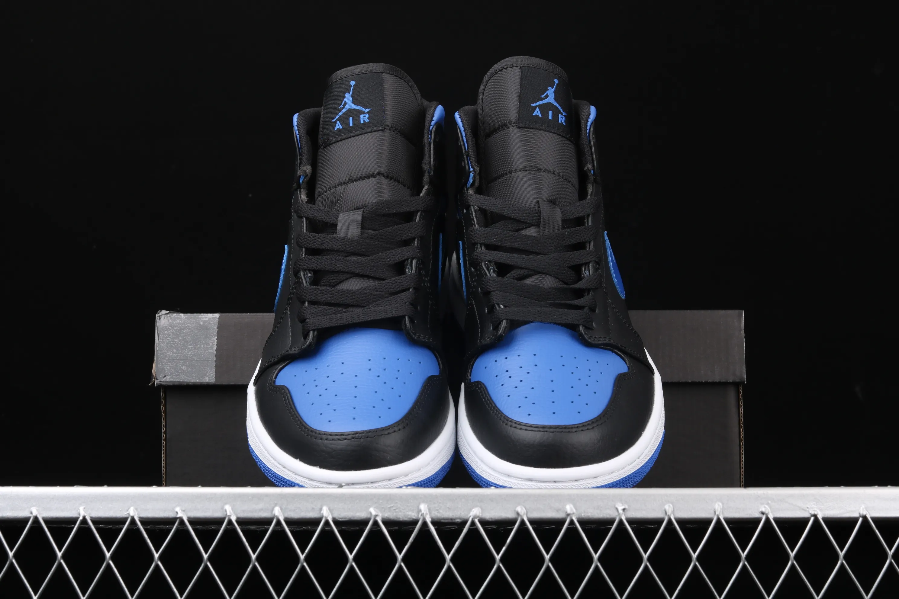 All categories Air Jordan Jordan series basketball shoes Air Jordan 1 Mid Air Jordan 1 Mid AJ1 Joe 1 mid-top black and blue basketball shoes 554724-068